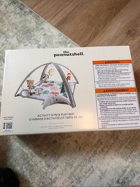 the Peanutshell Woodland Activity Gym & Play Mat - White/Green